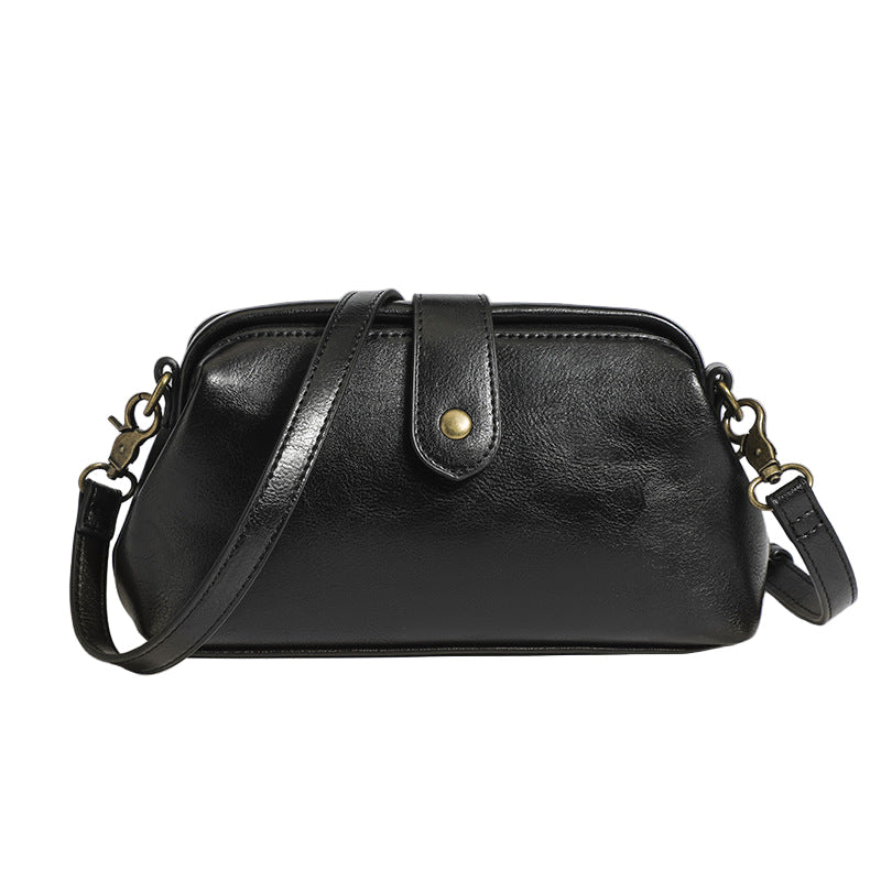FIENE | GESTRUCTUREERDE VINTAGE HANDTAS