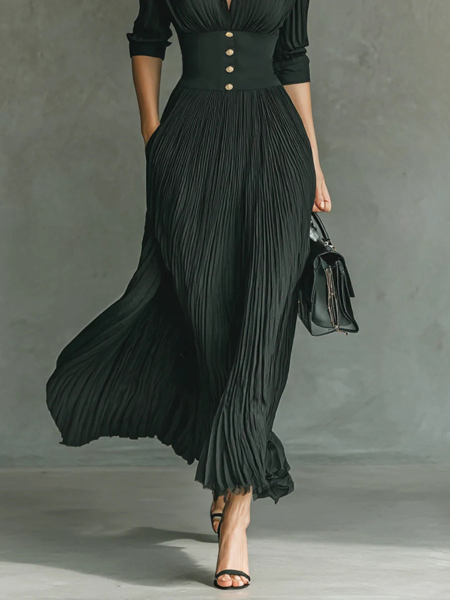 "Elvire | Lange Plissé Jurk met Revers en Hoge Taille" can be rewritten as "Elvire | Lange Plissé Jurk met Revers en Hoge Taille". 

If you want a different style or emphasis, here are a few alternatives:

1. "Elvire | Elegante Lange Plissé Jurk met Rever