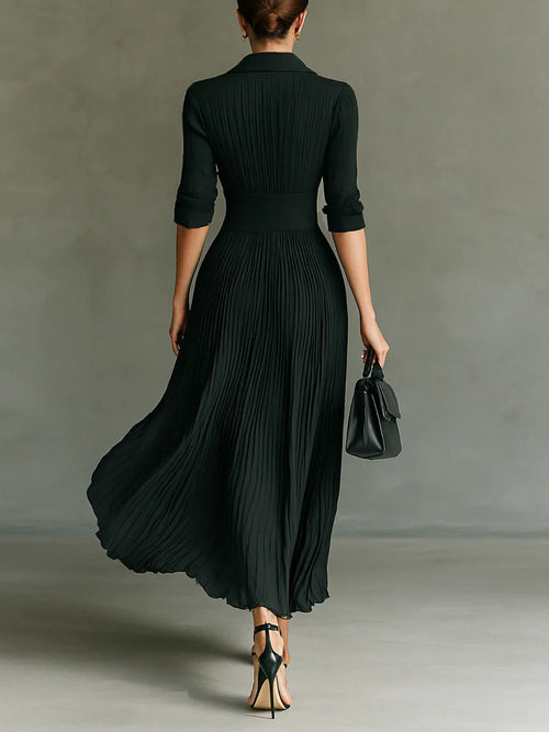 "Elvire | Lange Plissé Jurk met Revers en Hoge Taille" can be rewritten as "Elvire | Lange Plissé Jurk met Revers en Hoge Taille". 

If you want a different style or emphasis, here are a few alternatives:

1. "Elvire | Elegante Lange Plissé Jurk met Rever