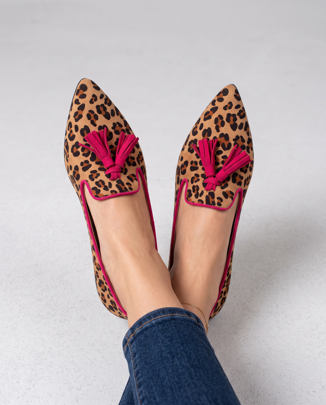 EVELIEN | MOCASSINS MET LUIPAARDPRINT EN FUCHSIA KWASTJES