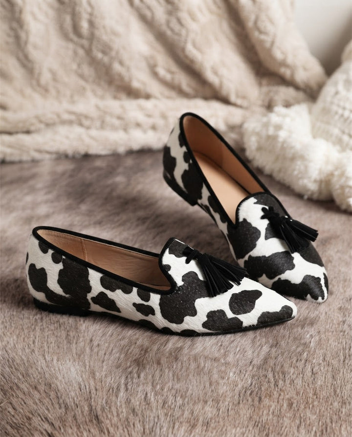 DANIQUE | ZWART-WITTE MOCASSINS MET KWASTJES