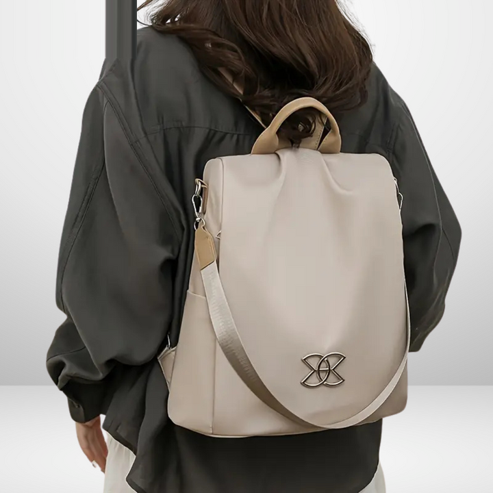 Mila anti-diefstal schoudertas beige gedragen
